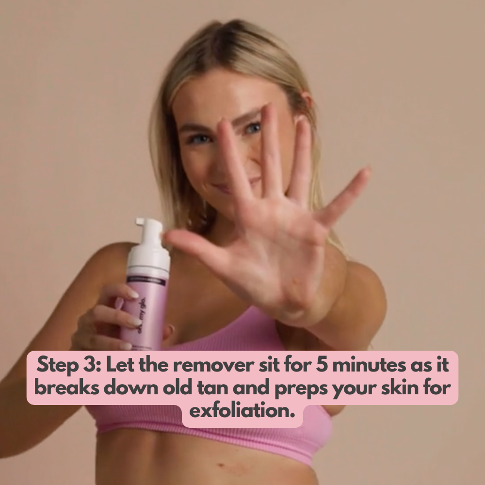 Model applying Ohh My Glo Tan Remover mousse and letting it sit for 5 minutes