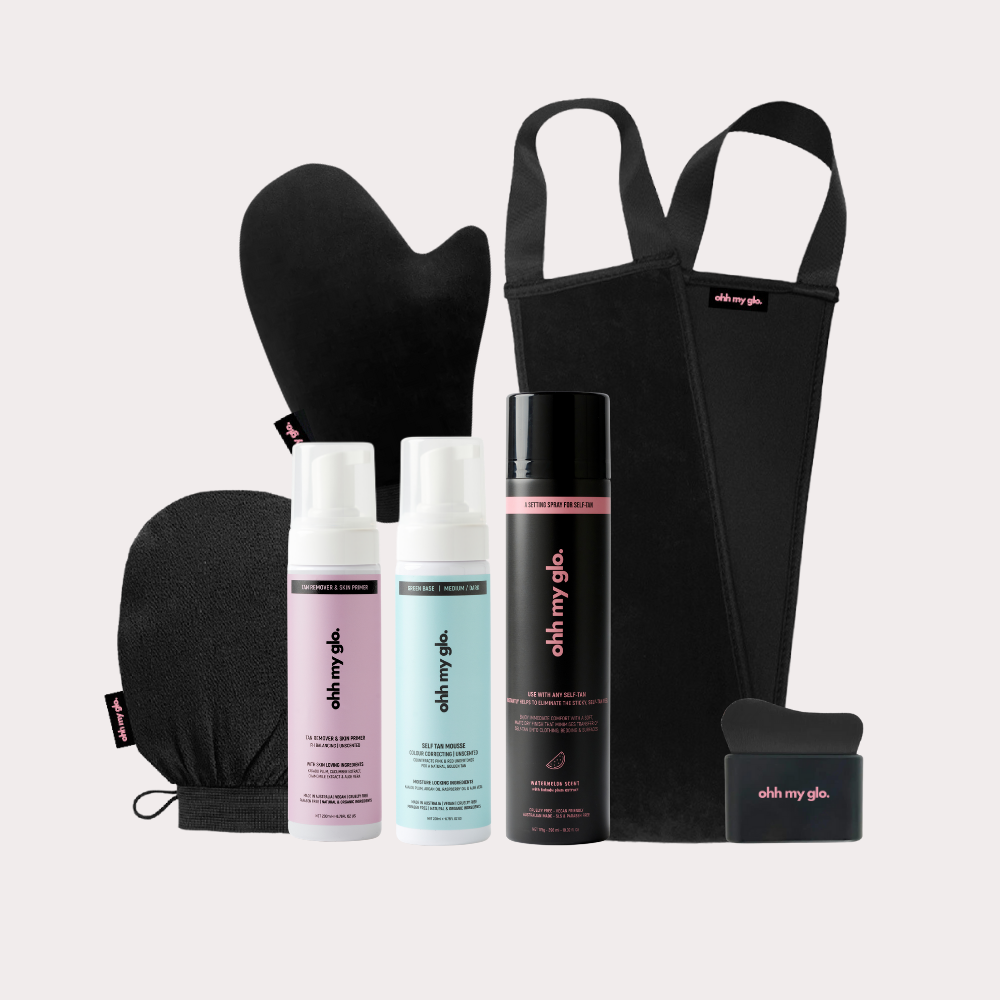 Ohh My Glo Ultimate Tanning Bundle with self tan mousse, setting spray, mitt, back applicator, and blending brush