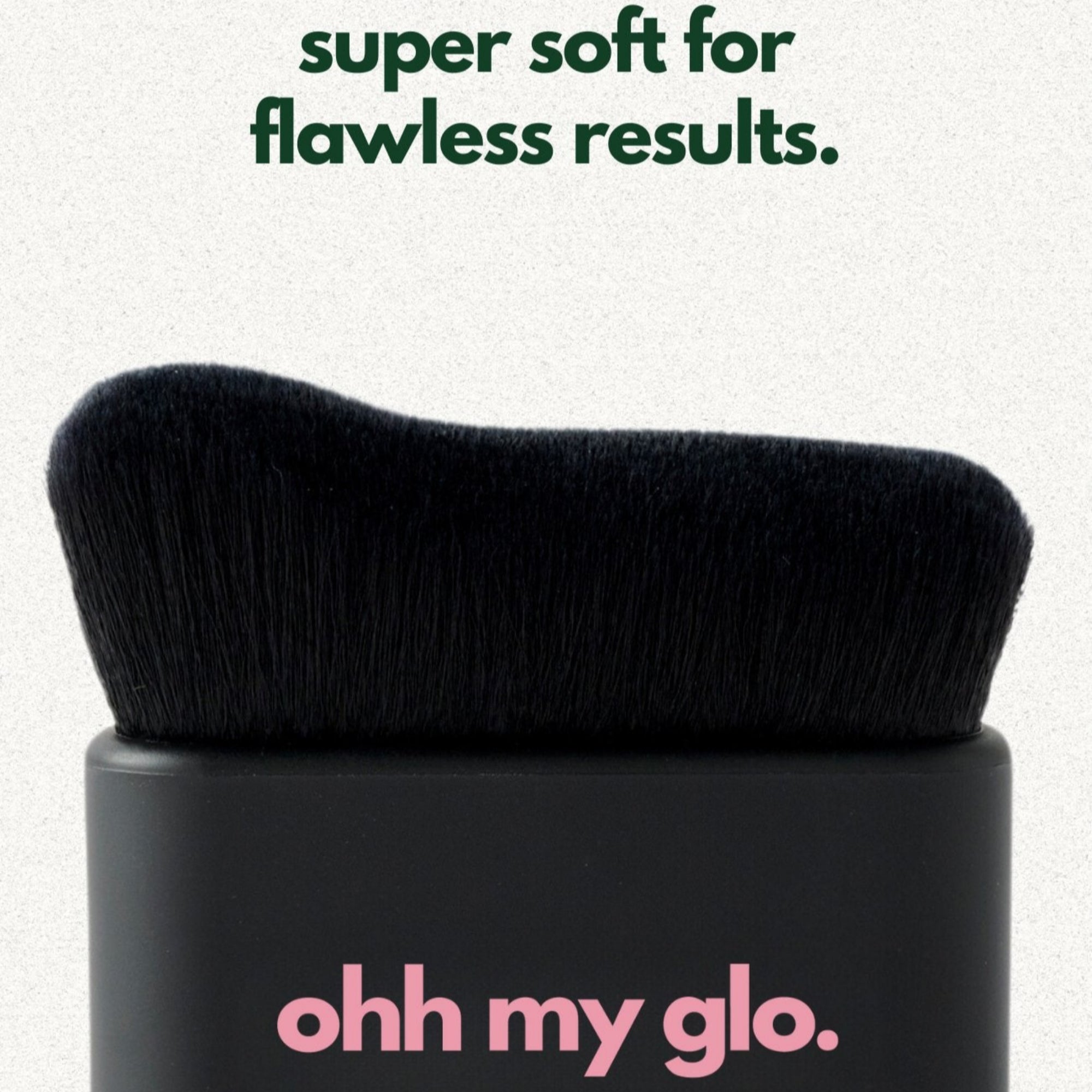Close-up of Ohh My Glo Blending Brush with soft black bristles for flawless results