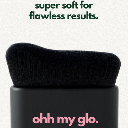 Close-up of Ohh My Glo Blending Brush with soft black bristles for flawless results