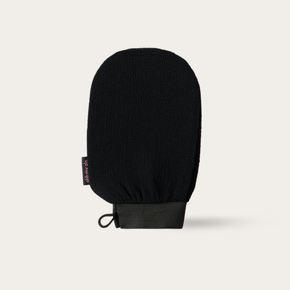 Ohh My Glo Exfoliating Glove product image on beige background