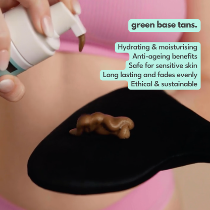 Applying Ohh My Glo Green Base Ultra Dark Tan Mousse for streak-free finish