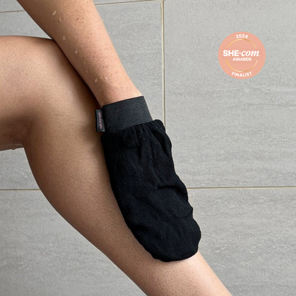 exfoliating glove in shower